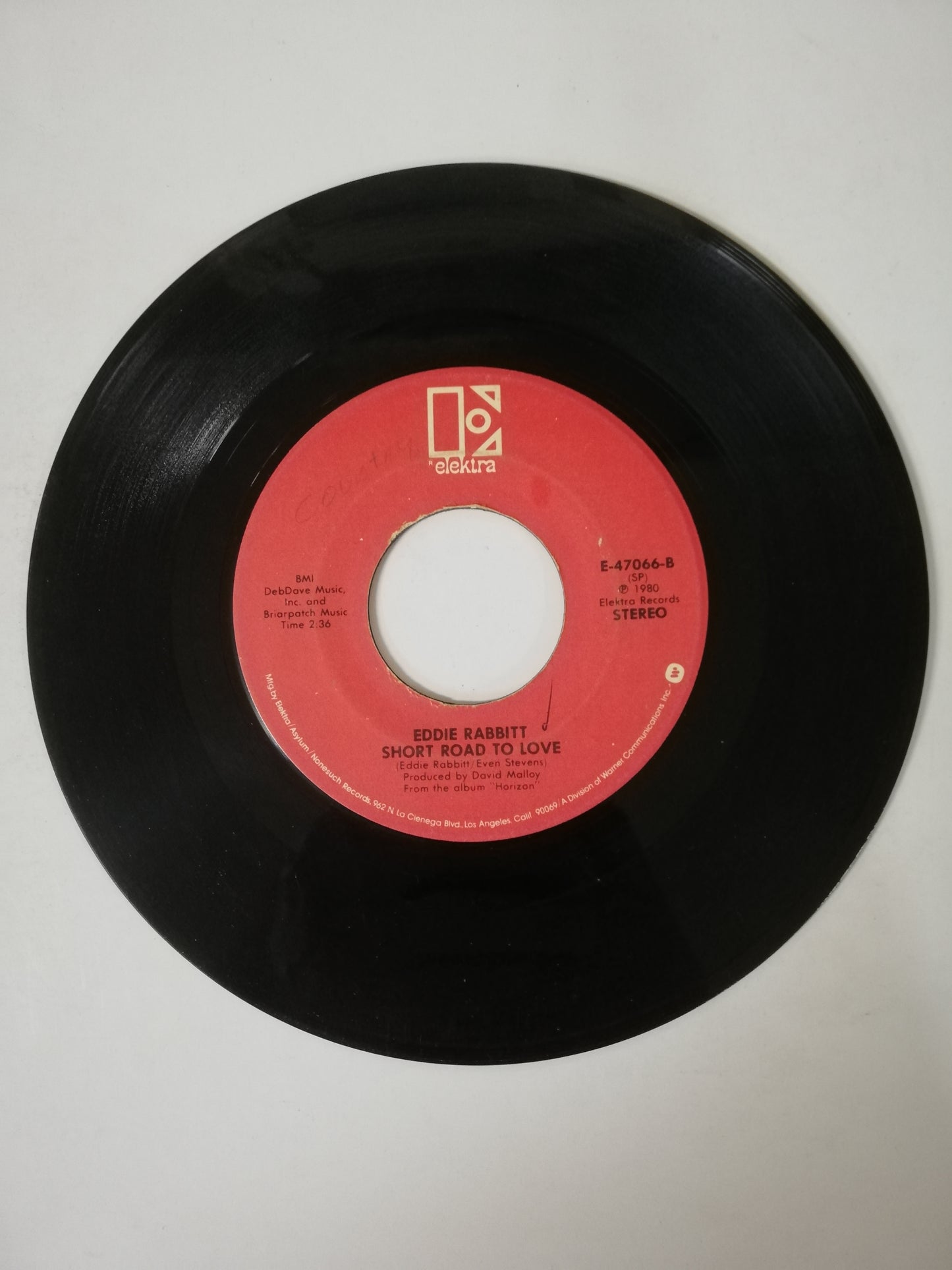 VINILO EDDIE RABBITT - I LOVE A RAINY NIGHT / SHORT ROAD TO LOVE