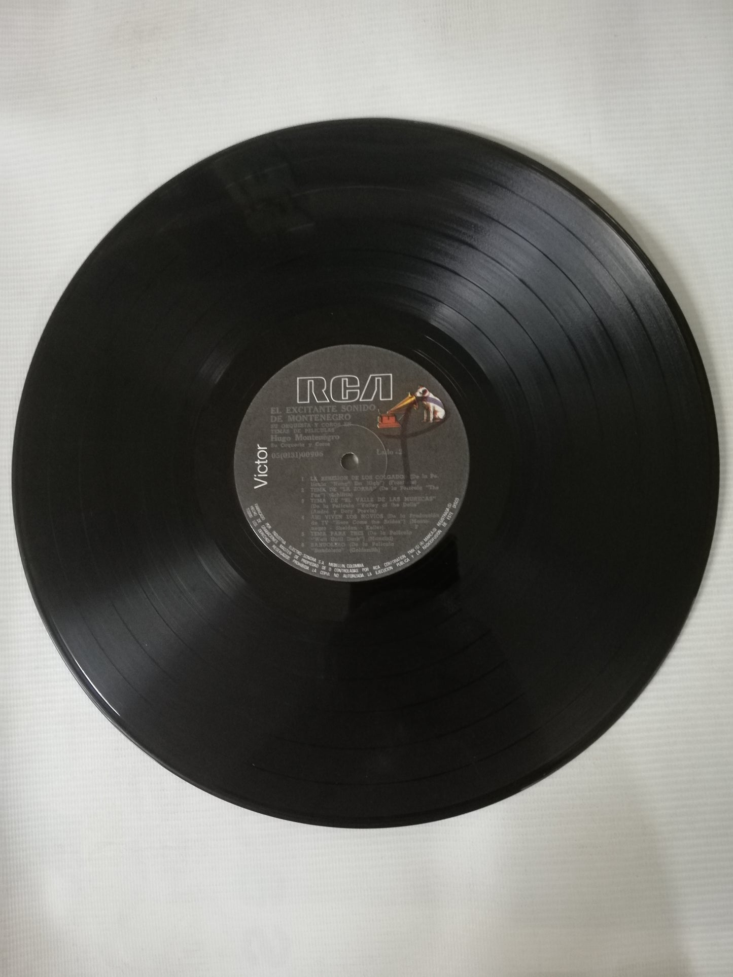 LP HUGO MONTENEGRO SU ORQUESTA Y COROS EN TEMAS DE PELICULAS - EL EXCITANTE SONIDO DE HUGO MONTENEGRO