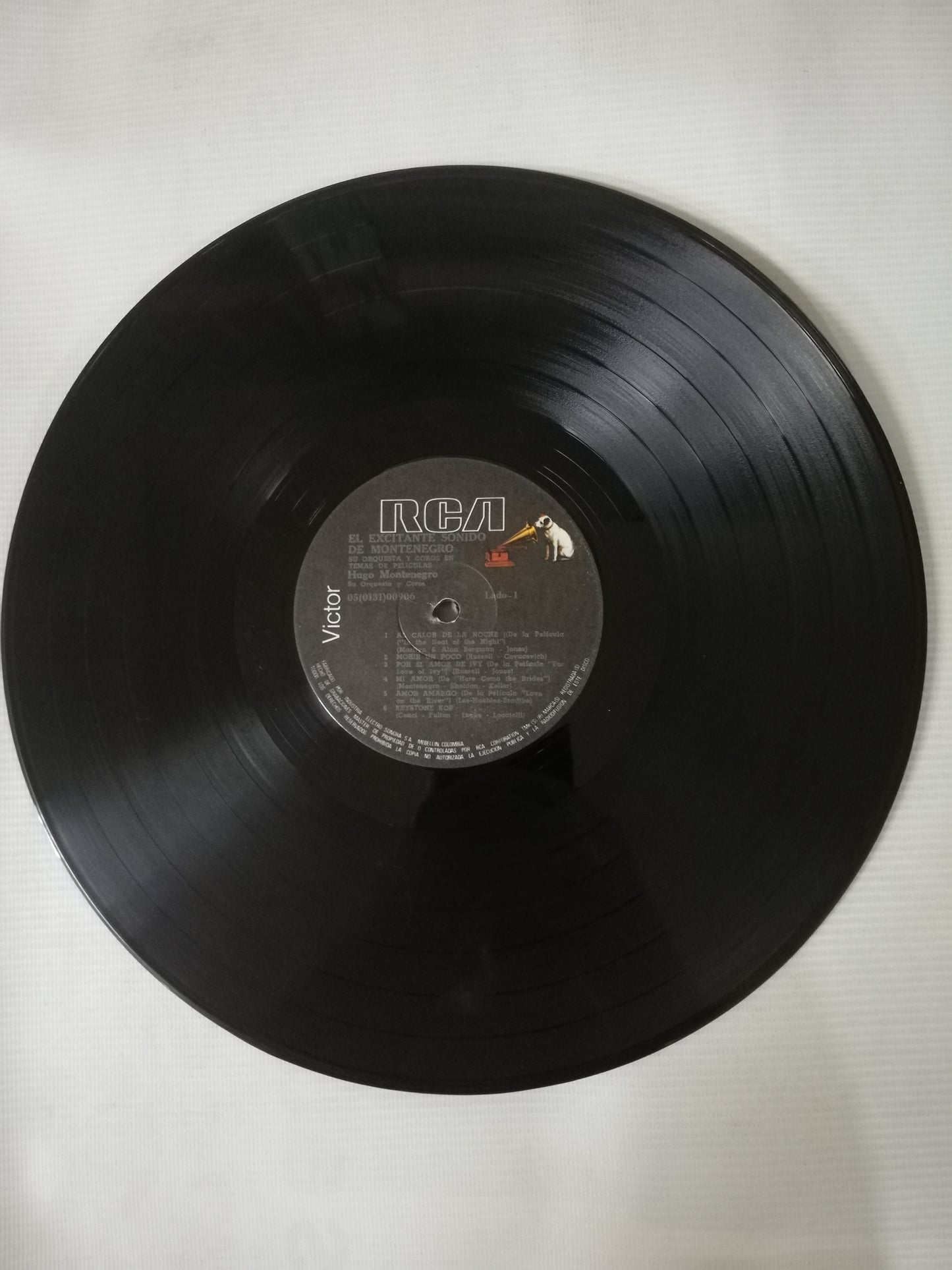 LP HUGO MONTENEGRO SU ORQUESTA Y COROS EN TEMAS DE PELICULAS - EL EXCITANTE SONIDO DE HUGO MONTENEGRO