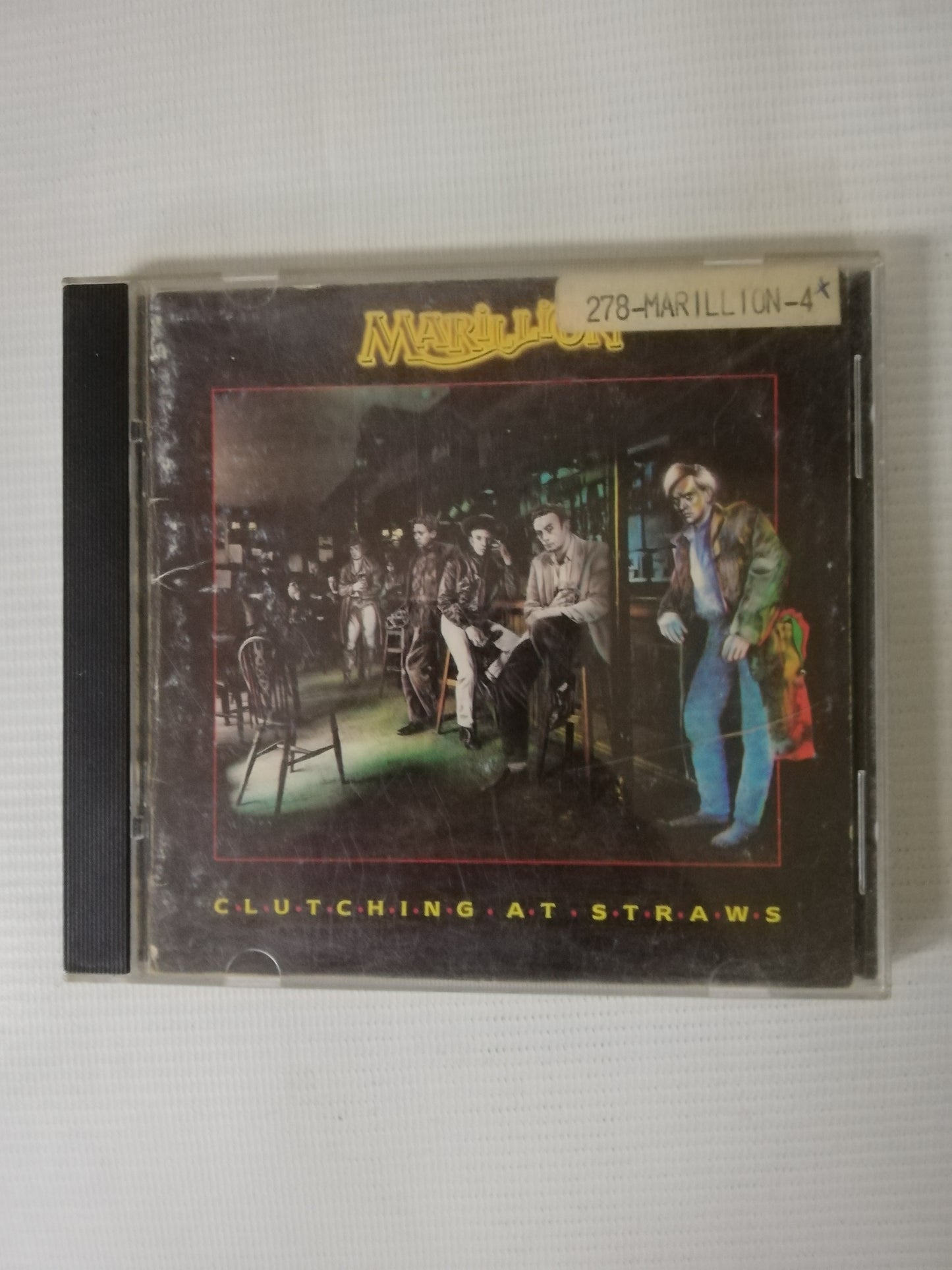 CD MARILLION - CLUTCHING AT STRAWS