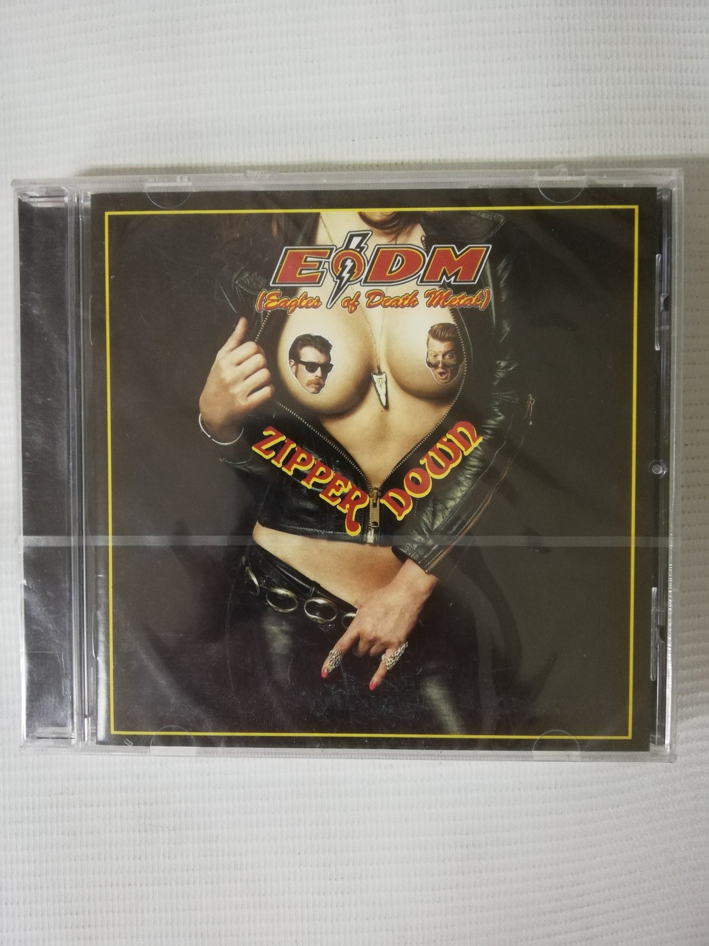 CD EAGLES OF DEATH METAL - ZIPPER DOWN
